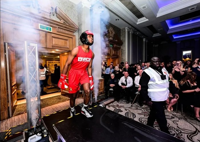 Keran walking out to the ring at an Ultra White Collar Boxing event